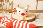 Weihnachtstasse Rentier weiß mit Kuschelsocken – Geschenkset