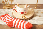 Weihnachtstasse Rentier weiß mit Kuschelsocken – Geschenkset